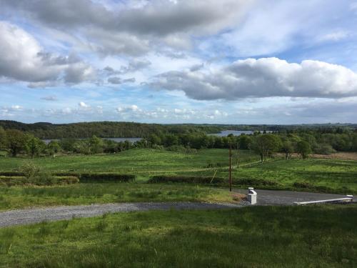 a fire hydrant on a road in a field at The Plain View in Boyle