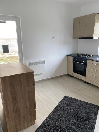 Η κουζίνα ή μικρή κουζίνα στο Apartament