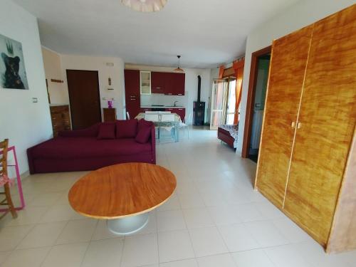 a living room with a couch and a table at Villa Italia2 in Contursi