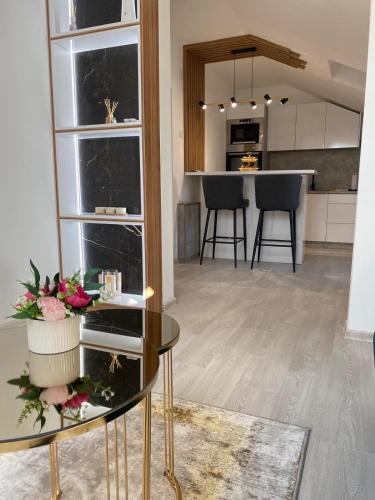 Kuchyň nebo kuchyňský kout v ubytování Legato Apartment