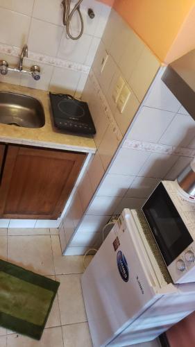 an overhead view of a kitchen with a sink at Apartamento Paseo del Lago in Montevideo