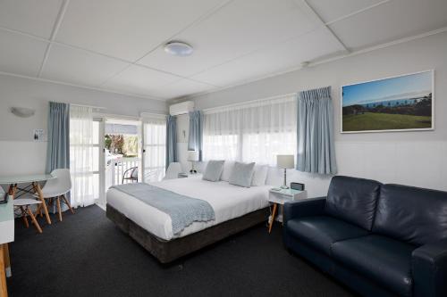Voodi või voodid majutusasutuse Harbour View Motel and Waterfront Apartments toas