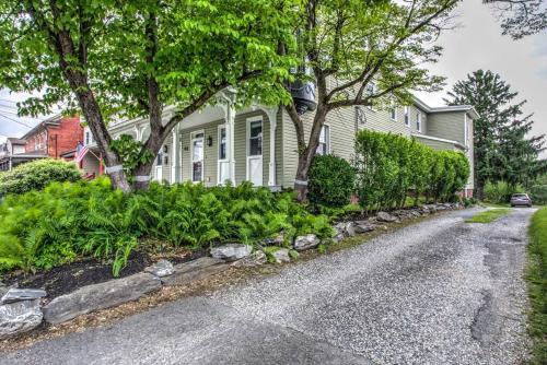 a house with trees and plants in the driveway at Victorian Manor on Main w 6 beds-10 mins to Lanc in Mountville