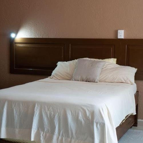 ALCOBY APARTMENTにあるベッド