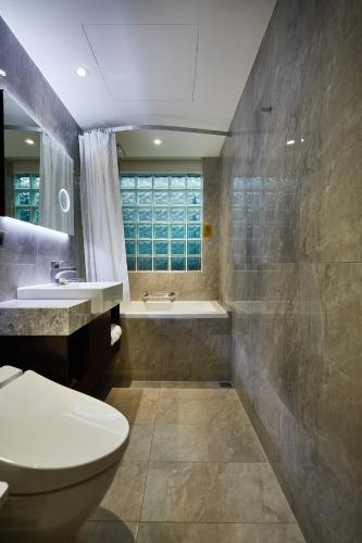 Koupelna v ubytování K Hotel Tianjin