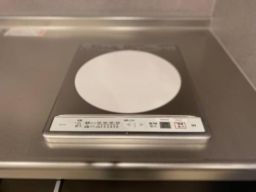 a remote control sitting on top of a ceiling at リブレ in Kumamoto 302 in Kumamoto