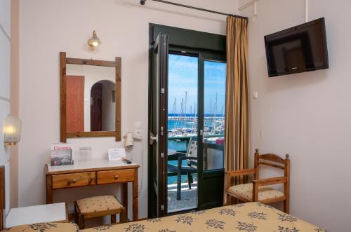 Postel nebo postele na pokoji v ubytování Hotel Coronis
