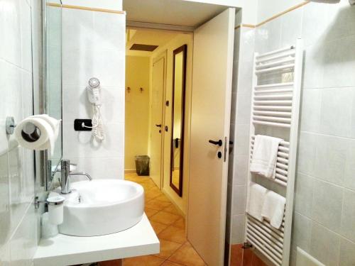 Koupelna v ubytování Hotel La Contrada