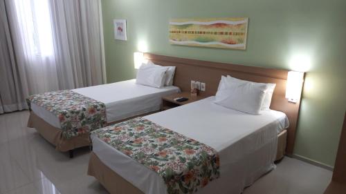 Кровать или кровати в номере #SENSACIONAL# PREMIUM HOTEL Manaus AM