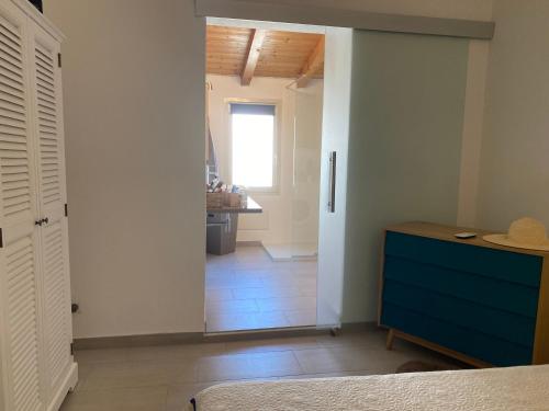 Ένα ή περισσότερα κρεβάτια σε δωμάτιο στο Casa Feffino