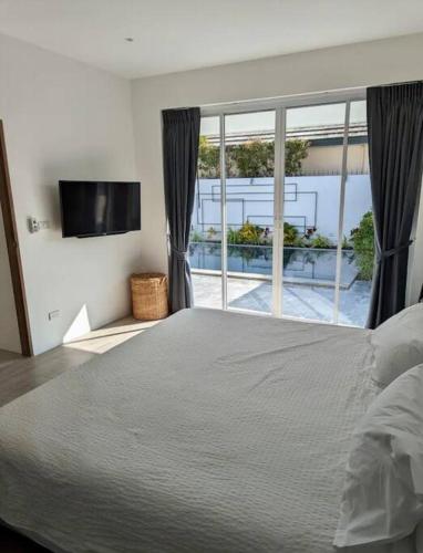 Postel nebo postele na pokoji v ubytování 1 Bedroom pool villa near beach
