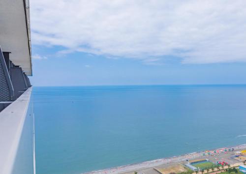 a view of the ocean from an airplane at Orbi City Hotel Official D Block in Batumi
