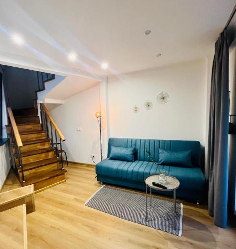 Posezení v ubytování Τwisted Loft