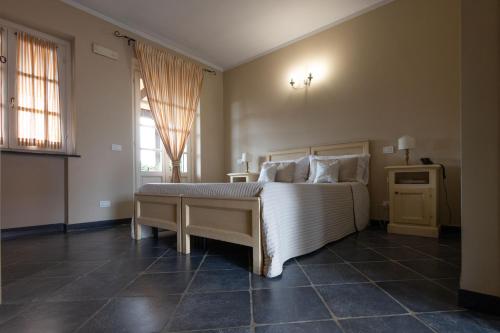 Ein Bett oder Betten in einem Zimmer der Unterkunft Albergo la Luna