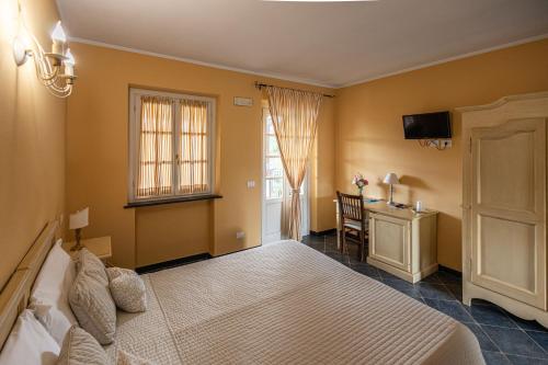 Ein Bett oder Betten in einem Zimmer der Unterkunft Albergo la Luna