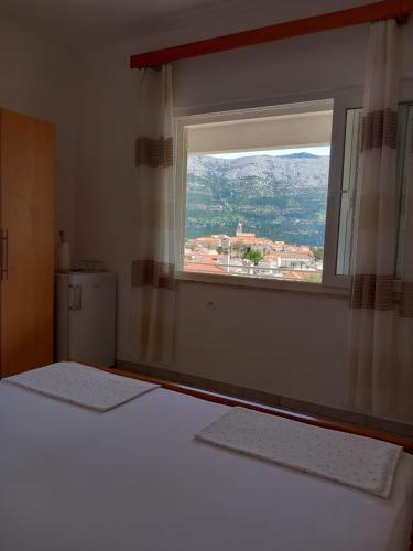 Ένα ή περισσότερα κρεβάτια σε δωμάτιο στο Accommodation Drasko