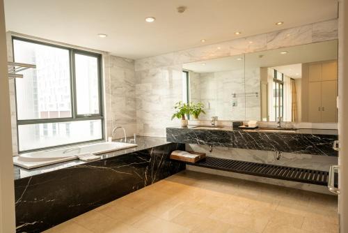 Ένα μπάνιο στο My Way Hotel & Residence Ha Noi