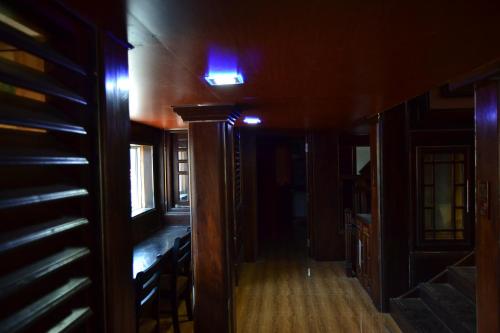 a hallway of a house with a light on the ceiling at BW Residence in Kalmunai