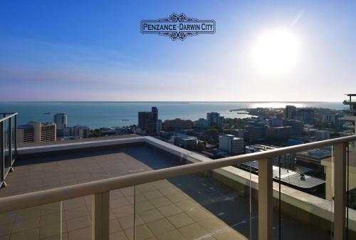 a view of the ocean from the balcony of a building at “PENZANCE” Great Location & Views at PenthousePads in Darwin