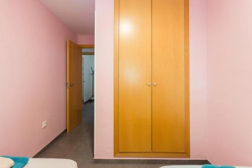 Postel nebo postele na pokoji v ubytování Delfines