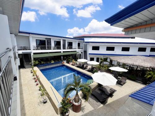 an aerial view of a hotel with a swimming pool at MGH Alona Resort in Panglao