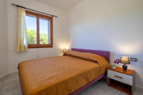 Tempat tidur dalam kamar di Casetta paradiso