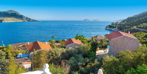 a view of a village on the coast of the ocean at Likya Pavilion Hotel in Kas