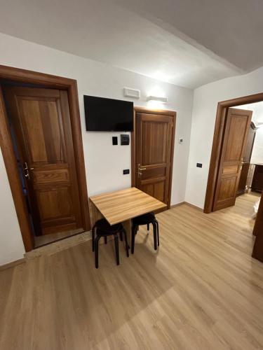 TV a/nebo společenská místnost v ubytování Pietrasuite Santa Brigida