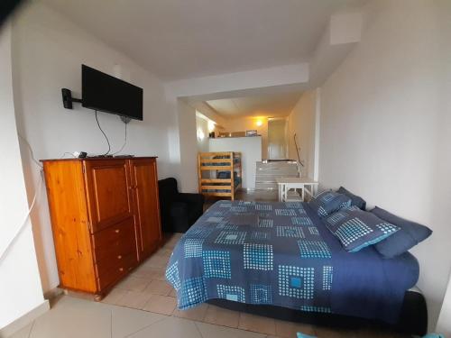 Postel nebo postele na pokoji v ubytování Umkomaas Lodge