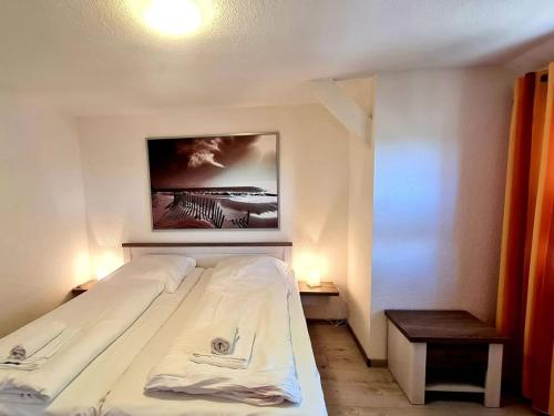 Boddenhus Apartmentにあるベッド