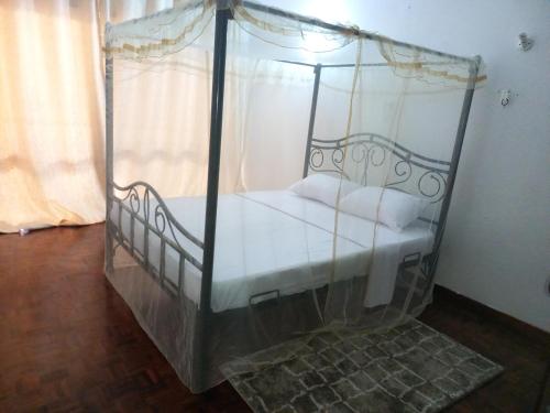 Säng eller sängar i ett rum på Gia Apartment