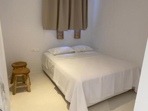 Säng eller sängar i ett rum på Villa Asin Tourlos