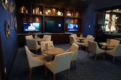 Télévision ou salle de divertissement dans l'établissement Luxury Suites International at The Signature