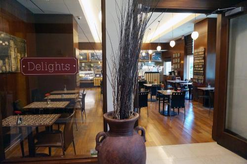 Restaurant ou autre lieu de restauration dans l'établissement Luxury Suites International at The Signature