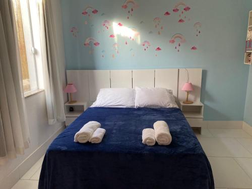 سرير أو أسرّة في غرفة في Casa do Point