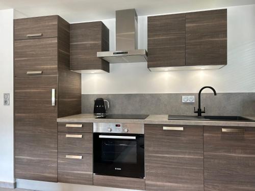 Appartement 48m² face aux pistes avec balcon, 4 couchages, près du centre des Gets, garage inclus
