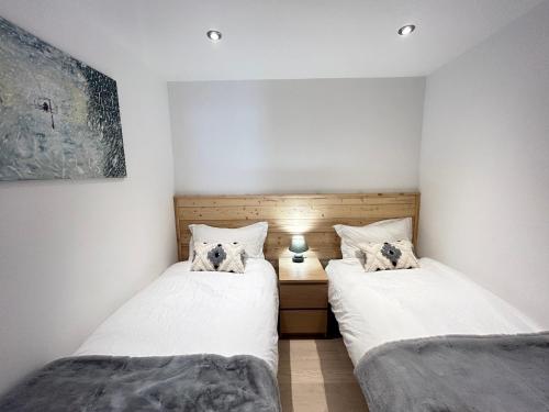 Appartement 48m² face aux pistes avec balcon, 4 couchages, près du centre des Gets, garage inclus