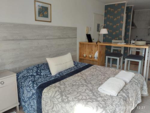 Postel nebo postele na pokoji v ubytování Monoambiente PANTER