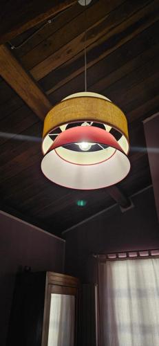 aendant light hanging from a ceiling in a room at La Casa dei Tigli in Cannara