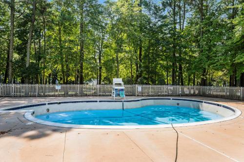 a small swimming pool in a yard at Sea Colony---1805 Doubles Court in Bethany Beach