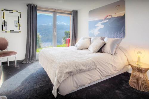 Ένα ή περισσότερα κρεβάτια σε δωμάτιο στο Chalet Kalyssia - OVO Network