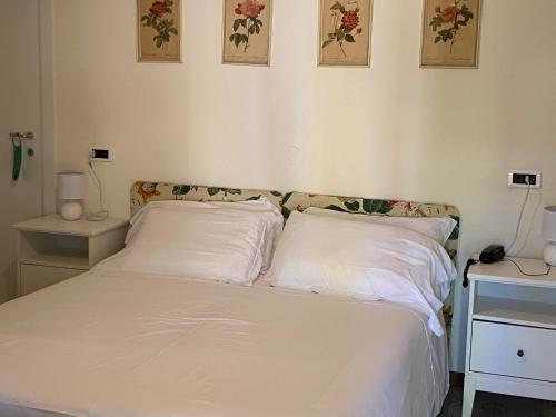 En eller flere senge i et værelse på Piccolo Hotel