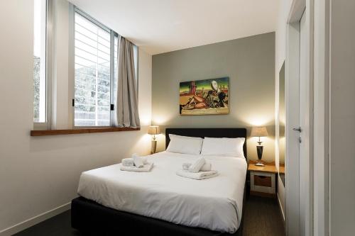Cama o camas de una habitación en Villa Borghese Flat With Terrace
