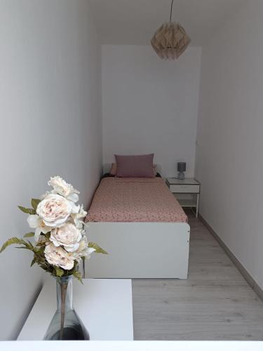 Ένα ή περισσότερα κρεβάτια σε δωμάτιο στο Holiday apartment