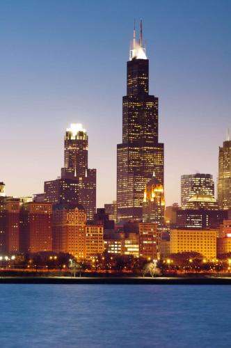 a view of a city skyline at night at Hampton Inn Chicago-Gurnee in Gurnee