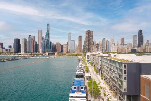 a view of a city with boats in the water at Sable At Navy Pier Chicago, Curio Collection By Hilton in Chicago