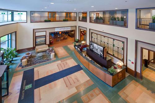 an overhead view of a lobby of a building at Embassy Suites by Hilton Chicago O'Hare Rosemont in Rosemont