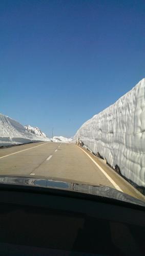 a view of a highway with snow covered barriers at Chalet Valaisia in Riederalp