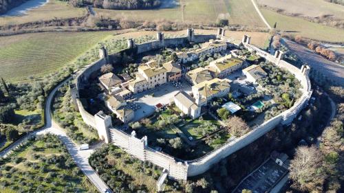 an aerial view of a large estate with a castle at La Torretta, Decameron View, sweet apartment in Certaldo