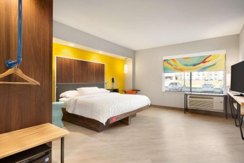 Postel nebo postele na pokoji v ubytování Tru By Hilton Cheyenne